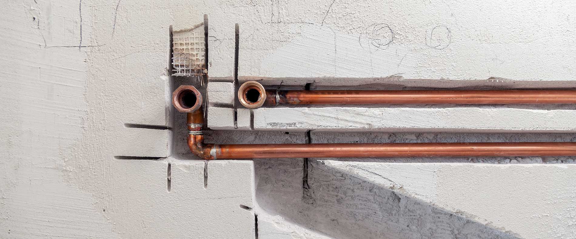 copper-pipes-in-foundation-of-walls